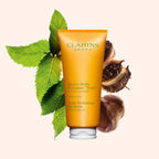 Clarins Tonic Moisturizing Body Balm-Oil - Image 1